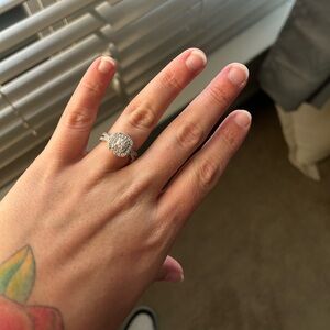 Size 9 engagement ring. 1/2 ct center and 2 ct crush halo